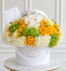 Luxury yellow, white and green flower arrangement with roses, hydrangeas and orchids in Miami