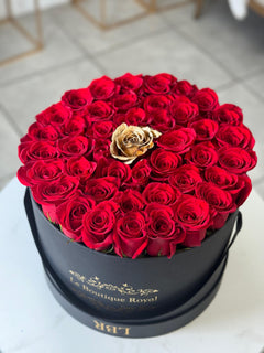 
                    
                      Red and Gold Roses in Signature Box – Luxury Flower Arrangement | Le Boutique Royal
                    
                  