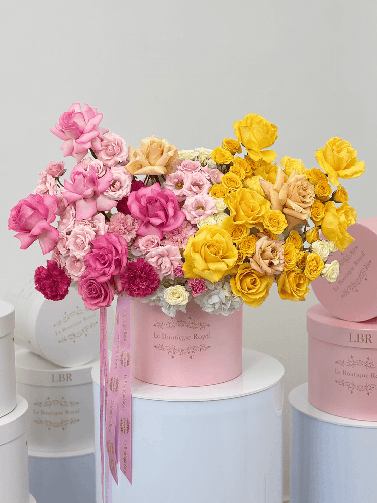 Premium yellow and pink roses by Le Boutique Royal