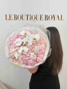 Luxury bouquet of blush pink hydrangeas and cascading white orchids