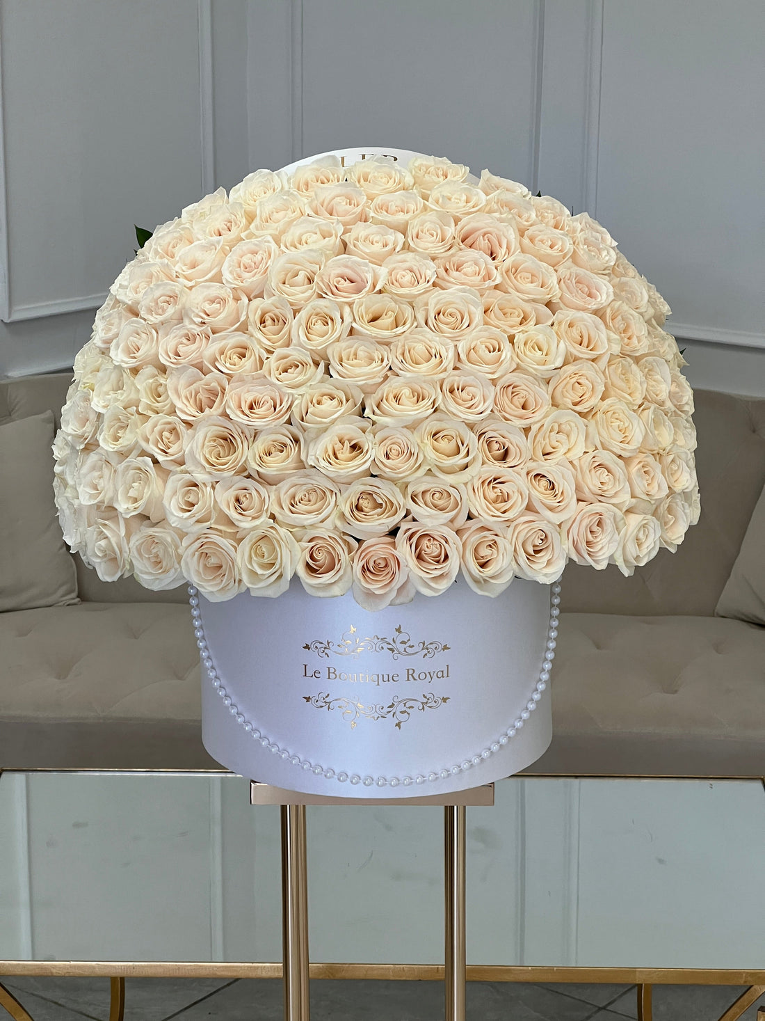 100 premium white roses in a white box