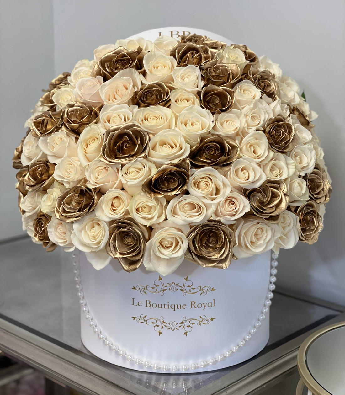 white and gold roses
