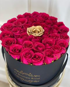 
                    
                      Hot Pink Roses With One Gold Rose
                    
                  