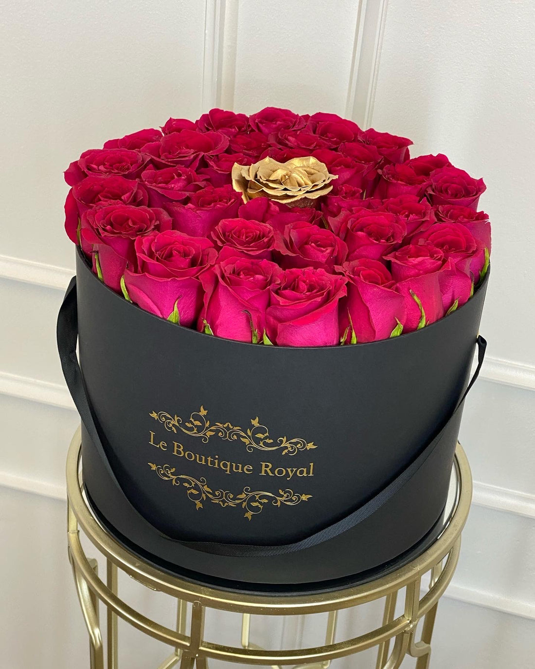 Hot Pink Roses With One Gold Rose