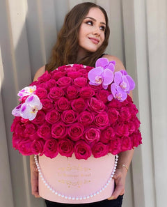 
                    
                      le boutique royal roses and a model
                    
                  
