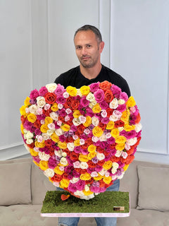 
                    
                      a person with the heart roses
                    
                  