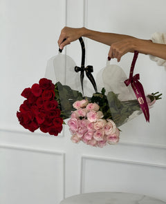 
                    
                      Rosas rojas y rosadas
                    
                  