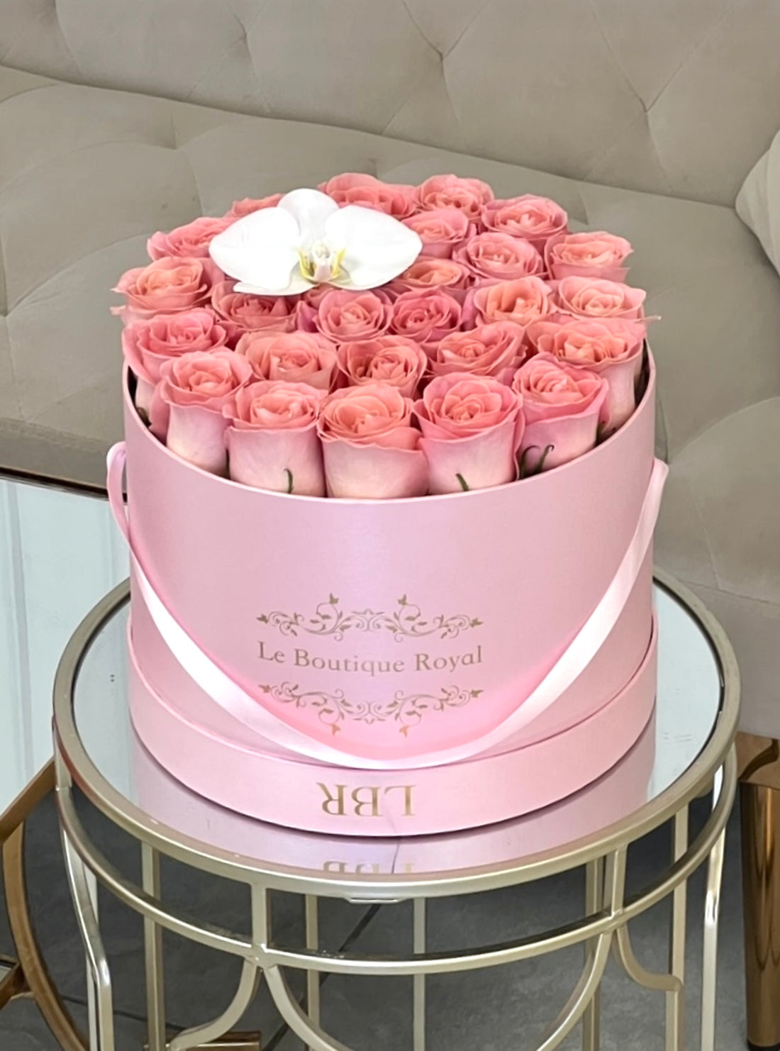 pink roses with orchid in a signature box
