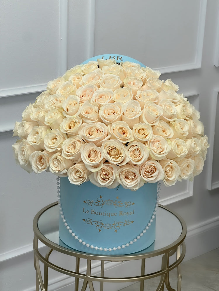 blue box with white roses