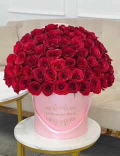 
                    
                      50 red roses in a hat box
                    
                  